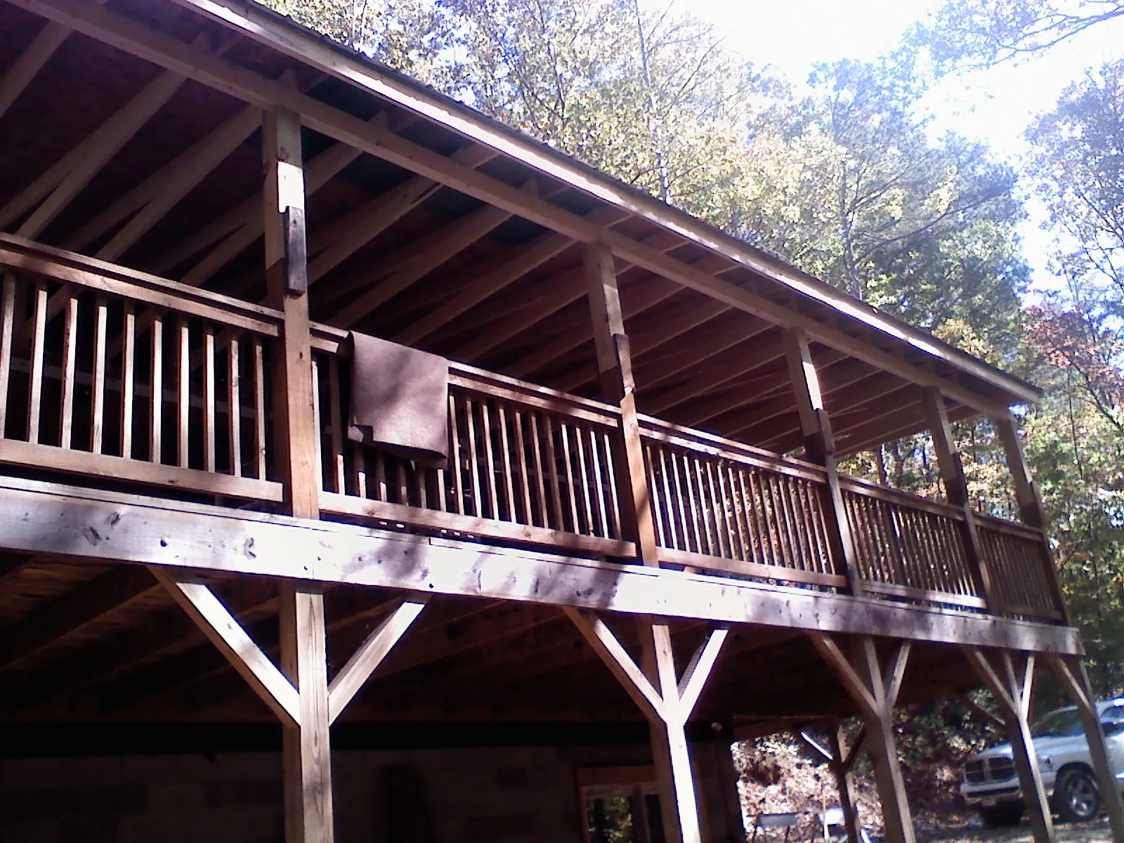 Timber framing under a new elevated porch and deck — Roof Leak Repair in Erskine by Roofing Brothers